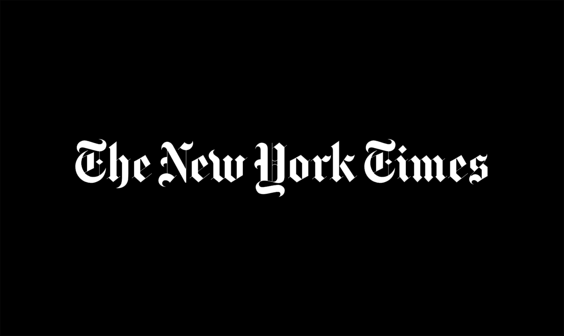 The logo of the new york times displayed in white gothic script on a black background.